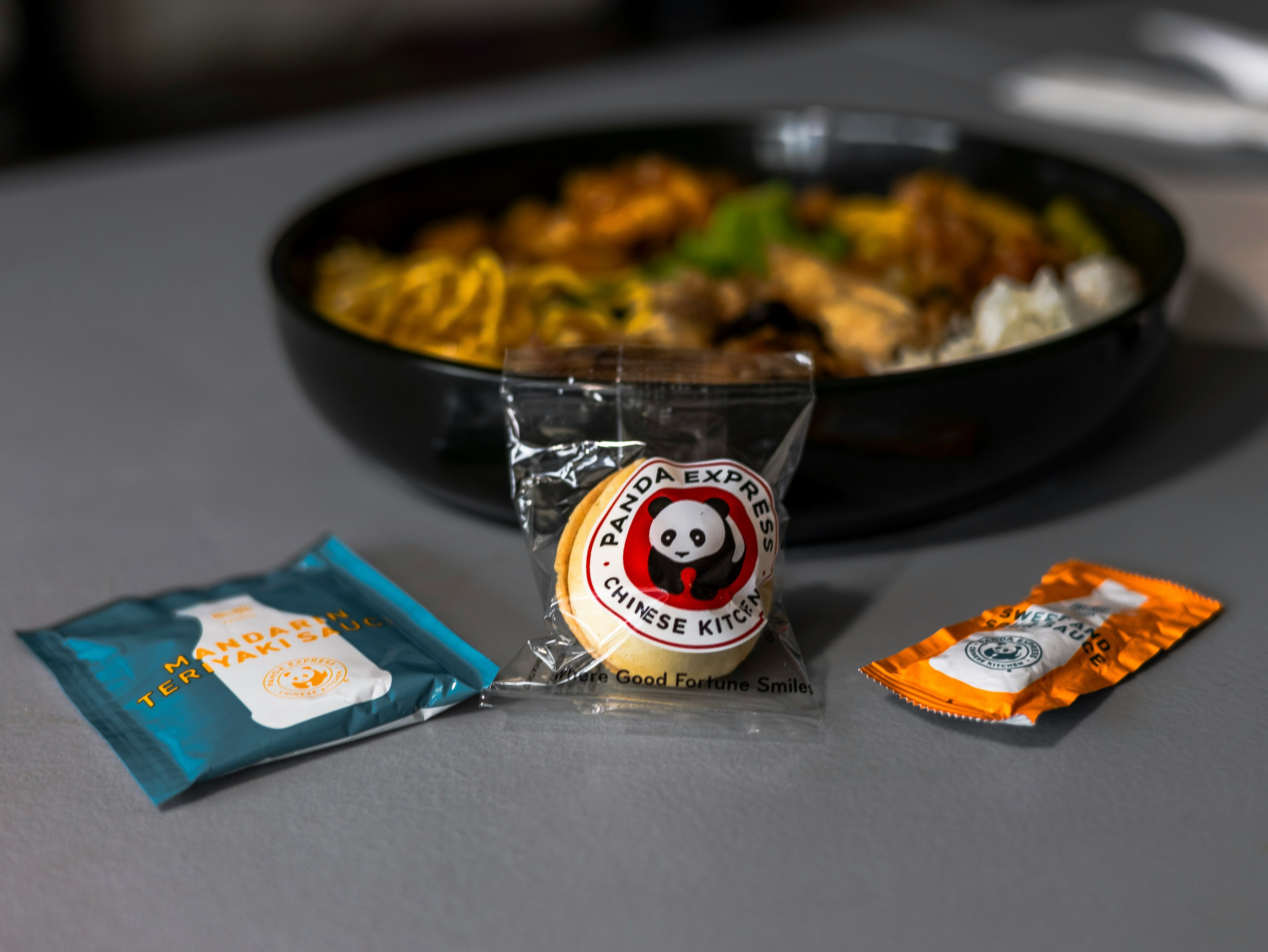 A bowl of food sitting on top of a table